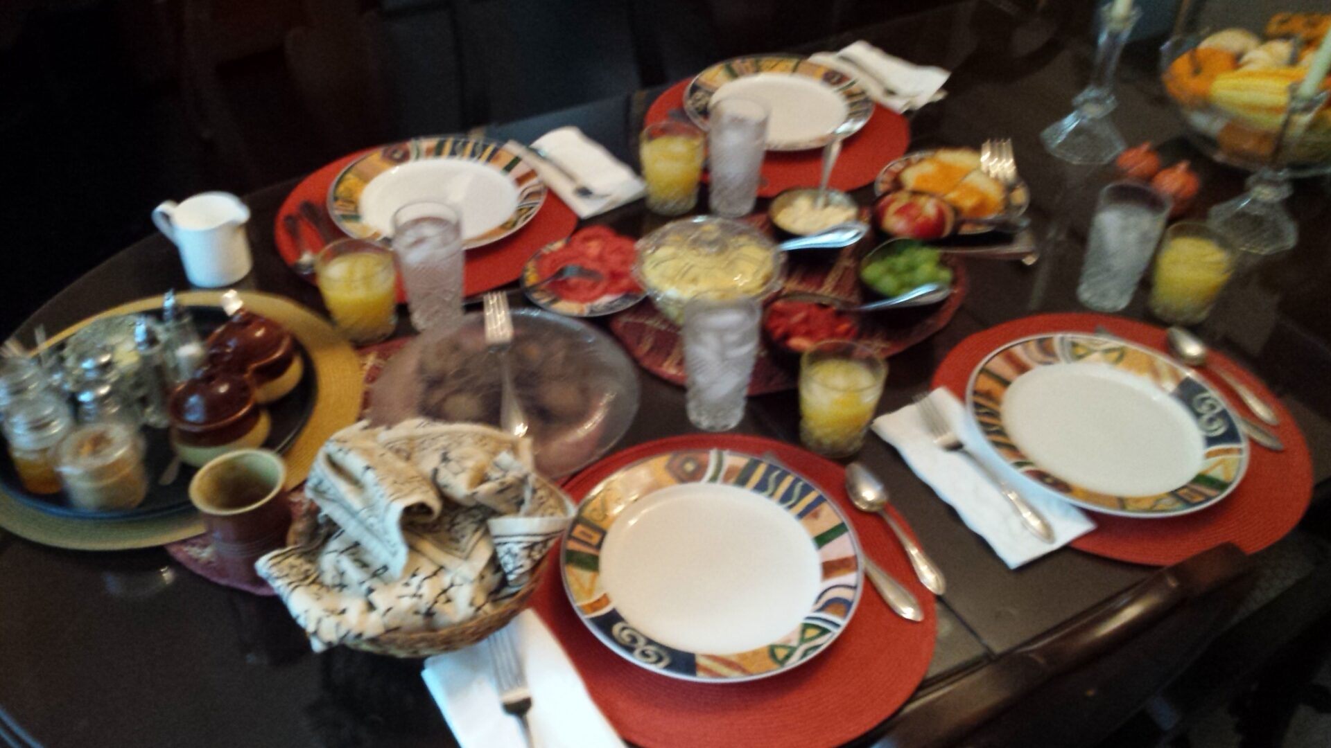 a closeup look at a dining table with plates kept