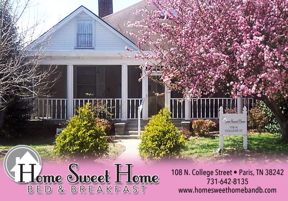 HSHBnB.com with lotsa pink and flowers in front.